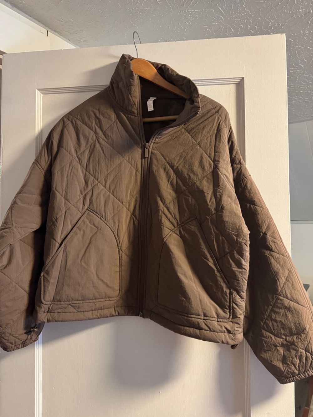 Zella Quilted Zip-Up Jacket in Brown
